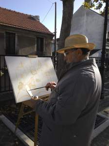 le peintre José Milheiro dessine l'église de Montigny les Cormeilles